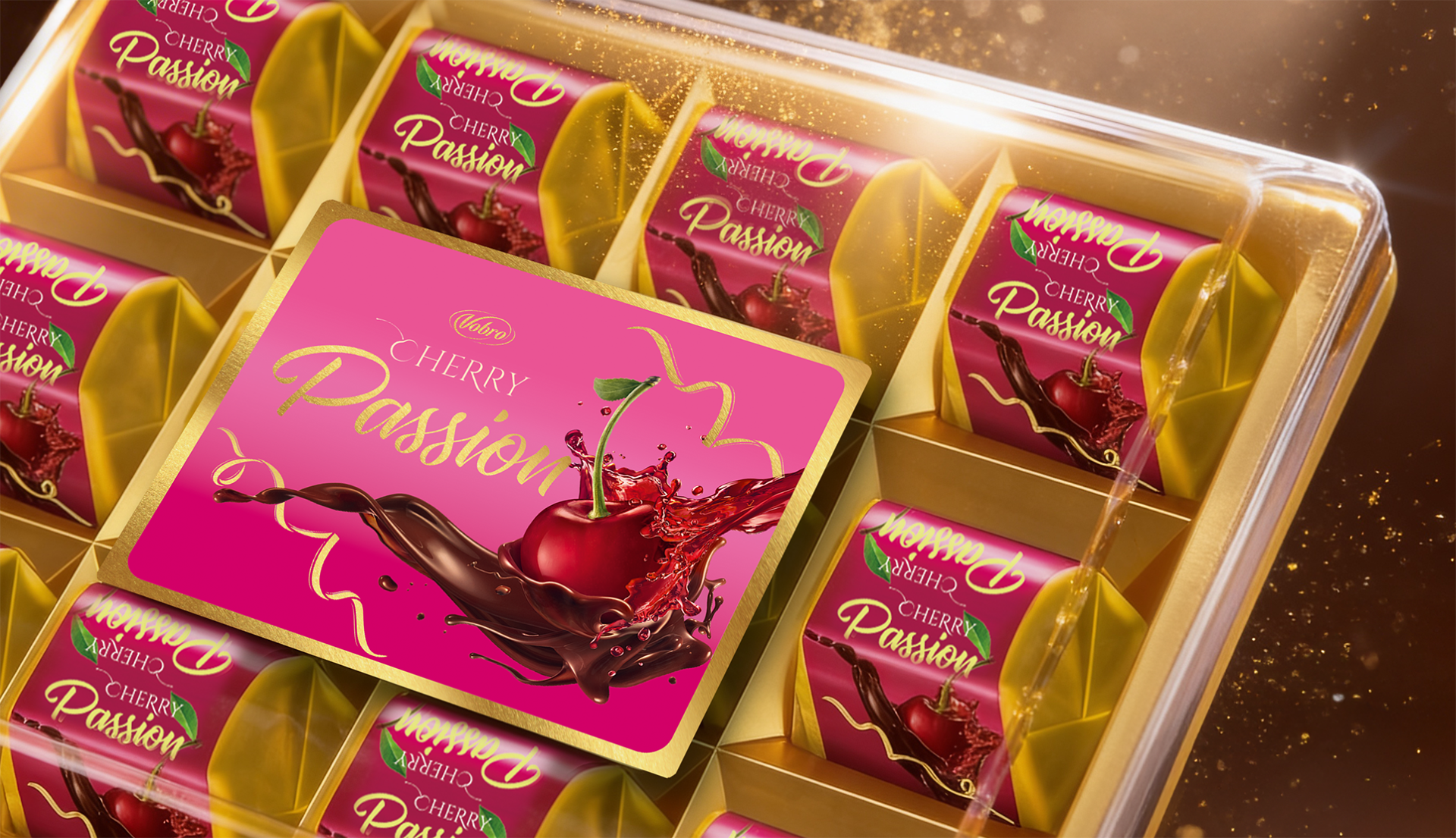 Open tray · pralines on gold backdrop